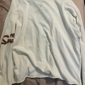 The Simpsons White Long Sleeve Shirt with Orange Text